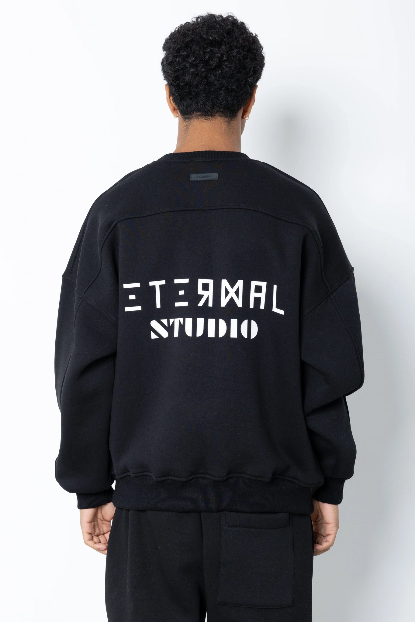 Felpa girocollo logo brick Eternal Studio