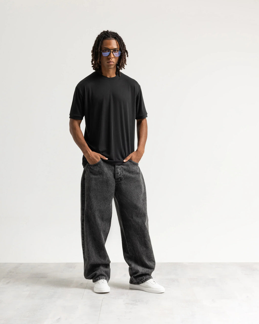 Jeans baggy nero con legature Eternal