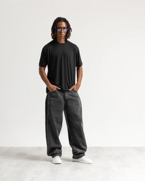 Jeans baggy nero con legature Eternal