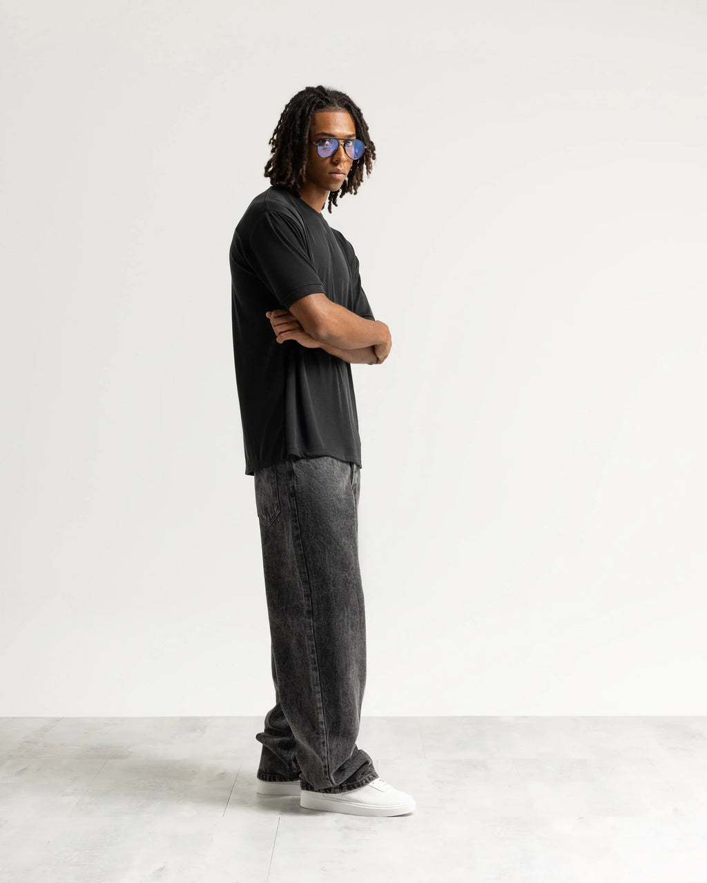 Jeans baggy nero con legature Eternal